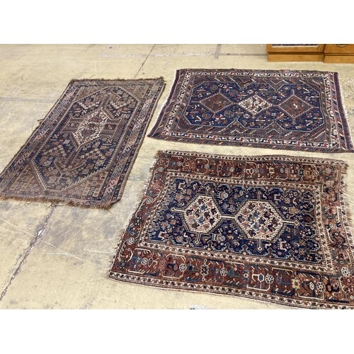 Three antique Caucasian blue ground rugs, largest 154 x 114 ...