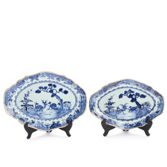 Two Chinese export blue and white porcelain dishes. 18th century. L. 29.5 and 33 cm. (2)
