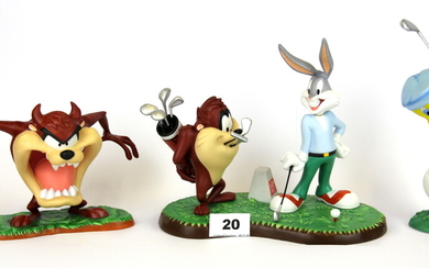 Two Coalport porcelain figures of Looney Tune characters playing golf and a further Wedgwood porcelain figure of the Tasmanian Devil, all wi