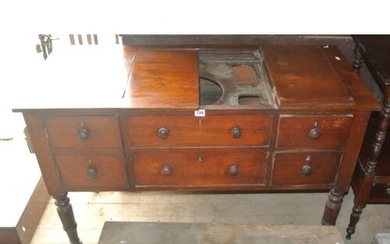 Victorian mahogany washstand with fold-out top and sectioned...