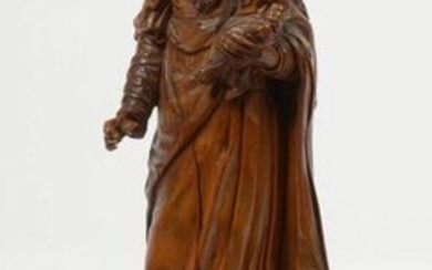"Virgin and Child" in carved boxwood with crowns and a silver scepter. Probably made in Mechelen. Period: 17th century. Resting on a blackened and red tortoiseshell wood base. (Light *). H.(out of the base):+/-19cm.