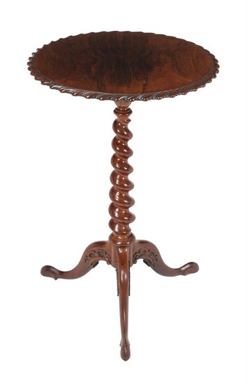 Y An early Victorian rosewood tripod table