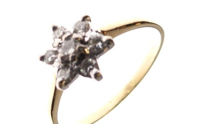 Yellow metal cluster ring set seven diamonds, size O,...