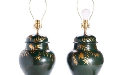 Pair of green and gilt painted lamps.