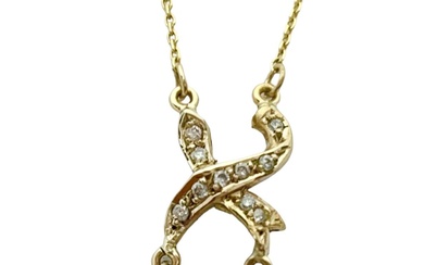 14K gold necklace and pendants set with about 0.10ct...