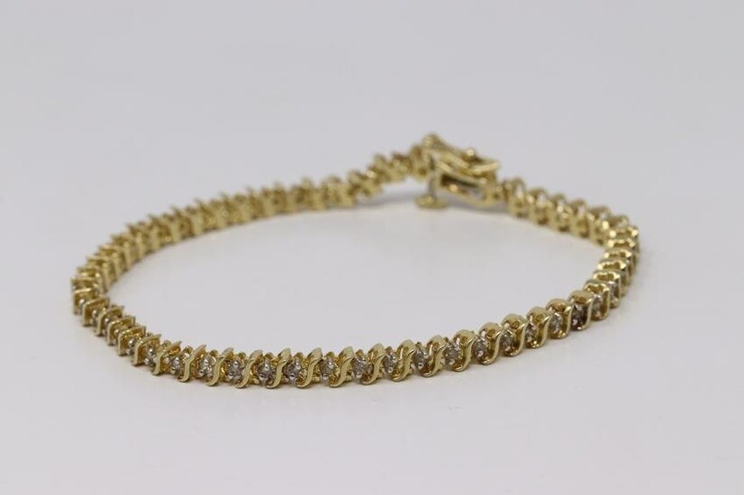 14Kt Yellow Gold Diamond Tennis Bracelet.