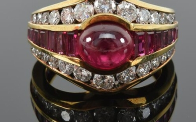 18K cabochon ruby and diamond ring, centering a