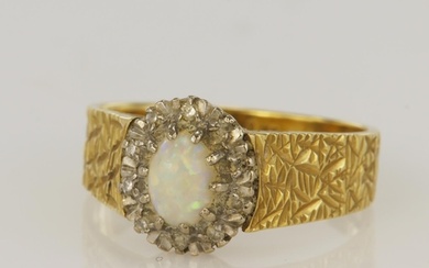 18ct yellow gold diamond and opal cluster ring, oval opal me...