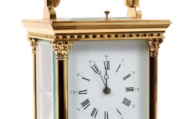 20th Century French carriage clock by L’Epee, the white enamelled dial with Roman and Arabic numerals and calendar day and date and alarm dial to the eight day two train movement striking and repea...