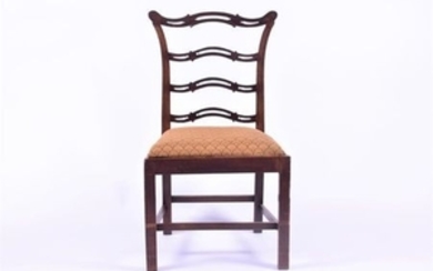 A 19th century mahogany single chair with shaped pierced bar-back, drop-in upholstered seat, on plain supports, 95 cm...