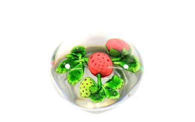 A Baccarat Strawberry Paperweight, circa 1850, set with one green...