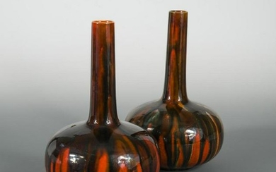 A pair of Burmantofts bottle vases, possibly designed