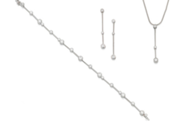 A diamond bracelet, pendant necklace and earring suite,, by Boodles