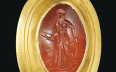 A GREEK GOLD AND CARNELIAN FINGER RING WITH ARTEMIS, HELLENISTIC PERIOD, CIRCA 2ND-1ST CENTURY B.C.