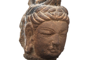 A limestone head of a Bodhisattva