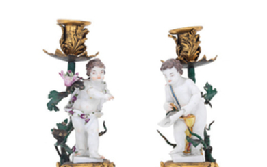 A pair of Meissen ormolu mounted candelabra