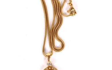 A peridot and diamond pendant by Catherine Best