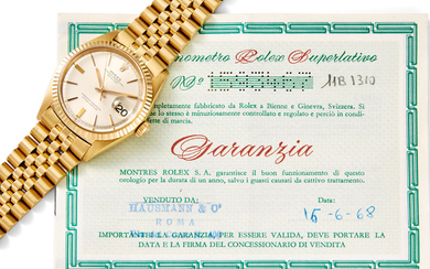 Rolex. A fine 18K gold automatic calendar bracelet watch