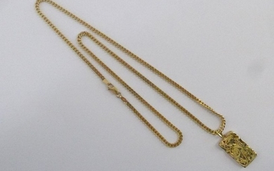 Une chaîne et un pendentif compression en or, long…