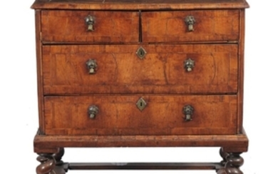 A walnut chest on stand