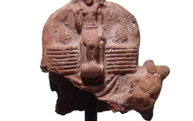Egyptian terracotta votive depicting seated pharaoh