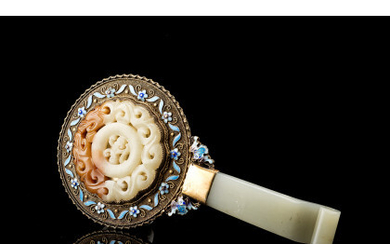 A jade belt hook mounted as a mirror handle, with gilt and enamelled mounts China, early 20th century (l. 16.5...