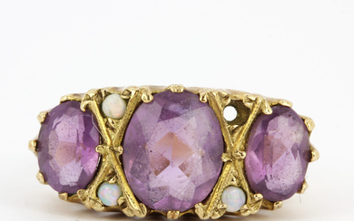 9CT, AMETHYST AND OPAL RING.