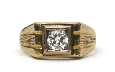 A 14 karat gold diamond solitaire ring, ca. 0.65 ct.