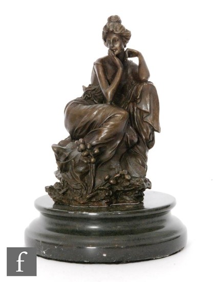 A 20th Century bronze study of a seated female figure restin...