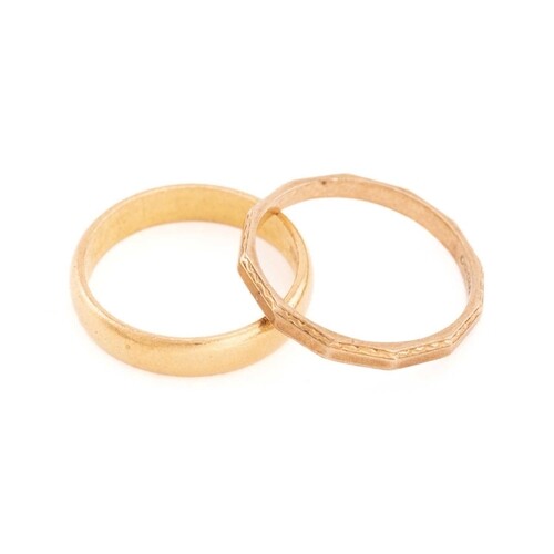 A 22ct gold wedding band and a 9ct gold ring; a plain D-sect...