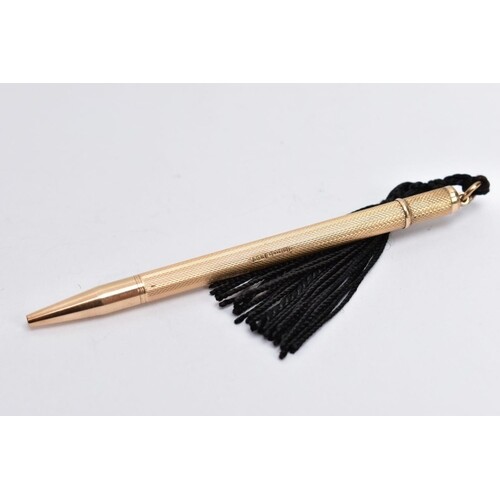A 9CT GOLD PROPELLING PENCIL, engine turned design with a va...