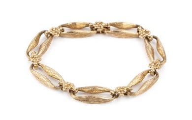 A 9ct gold bracelet, formed of shaped and textured elongated...