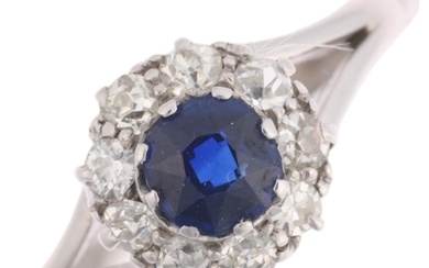A 9ct white gold sapphire and diamond cluster ring, claw set...