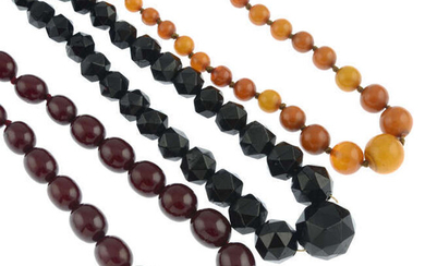 A Bakelite bead necklace, an amber bead necklace and a black gem bead necklace.