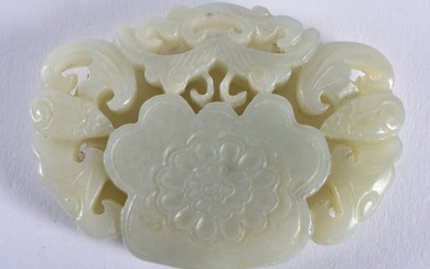 A CHINESE CARVED GREEN JADE PENDANT 20th Century. 6 cm x 4.5 cm.