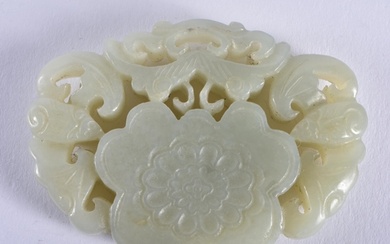 A CHINESE CARVED GREEN JADE PENDANT 20th Century. 6 cm x 4.5...