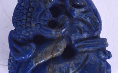A CHINESE CARVED LAPIS BOULDER, forming a mythical