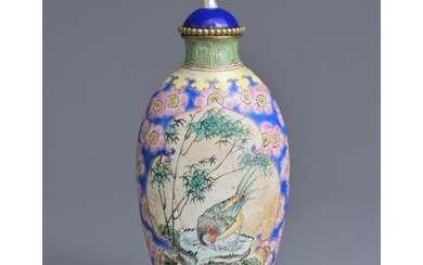 A CHINESE PAINTED ENAMEL SNUFF BOTTLE, QING DYNASTY. Tall ov...