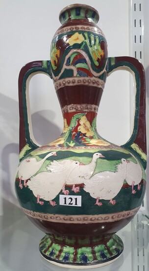 A CHINESE TWIN HANDLED VASE