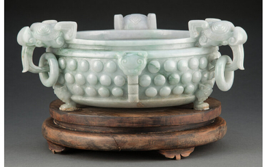 A Chinese Carved Jadeite Bowl on Carved Wood Stand