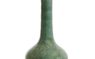 A Chinese Longquan celadon moulded and carved bottle vase Ming dynasty The...