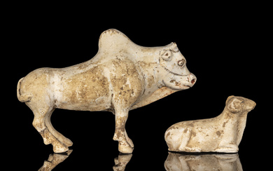 A Chinese Painted Pottery Figures of an Ox and a Ram