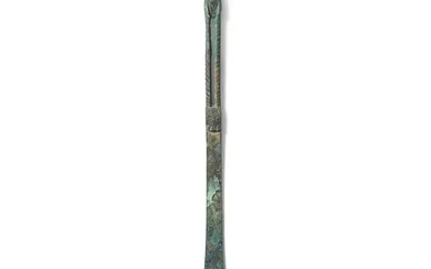 A Chinese archaic bronze ritual ladle Han dynasty The handle with stylised...
