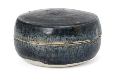 A Chinese blue-glazed pottery cosmetic box, Tang dynasty, of circular...