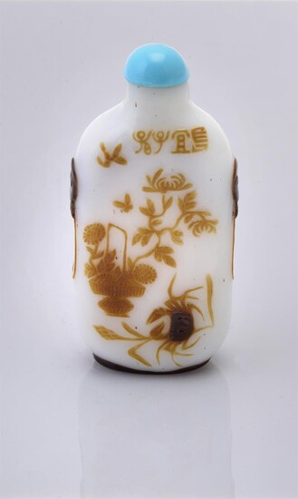 A Chinese carved overlay snuff bottle