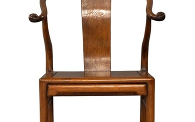 A Chinese rosewood horseshoe back armchair, quanyi, 20th century, the crestrail terminating in scrolls supported by curved splat in the centre and shaped splats to the side extended from the back legs, solid seat, 80cm high. 二十世紀 花梨雕圈椅