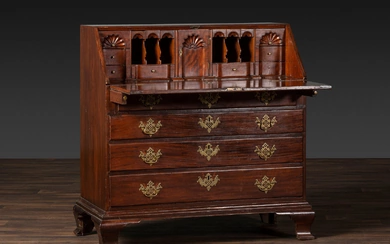 A Chippendale Figured and Shell-Carved Mahogany Slant Front Desk