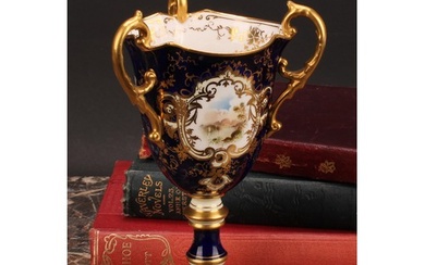 A Coalport three-handled pedestal ovoid cup or vase, painted...