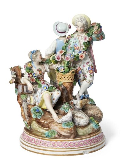 A Continental Meissen style porcelain figure group,...