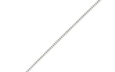 A DIAMOND LINE BRACELET in white gold, set with a single row of round brilliant cut diamonds all